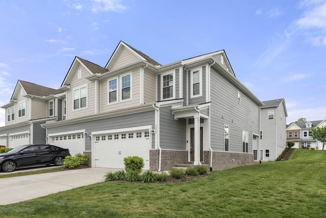 view of front of house featuring concrete driveway, brick siding, a front lawn, and a garage