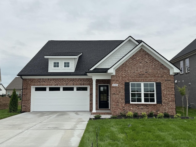 4020 Runyan Cv, Murfreesboro, TN 37127 - craftsman inspired home featuring brick siding, a front yard, concrete driveway, and roof with shingles
