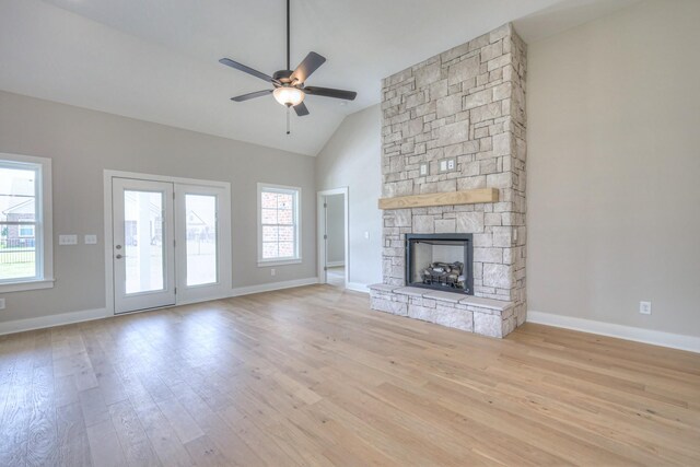 4020 Runyan Cv, Murfreesboro, TN 37127 - unfurnished living room featuring ceiling fan, light wood-style floors, a fireplace, and high vaulted ceiling