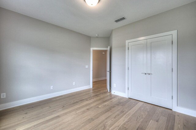4020 Runyan Cv, Murfreesboro, TN 37127 - unfurnished bedroom featuring light wood finished floors and a closet