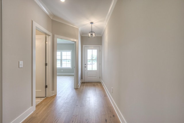 4020 Runyan Cv, Murfreesboro, TN 37127 - entryway featuring crown molding, light wood-style floors, and a chandelier