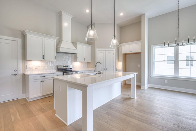 4020 Runyan Cv, Murfreesboro, TN 37127 - kitchen with electric range, custom exhaust hood, decorative backsplash, high vaulted ceiling, and light countertops