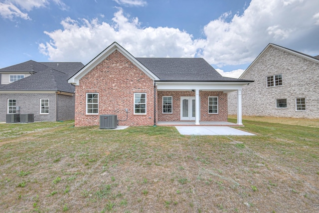 4020 Runyan Cv, Murfreesboro, TN 37127 - rear view of house featuring brick siding, a yard, and a patio area