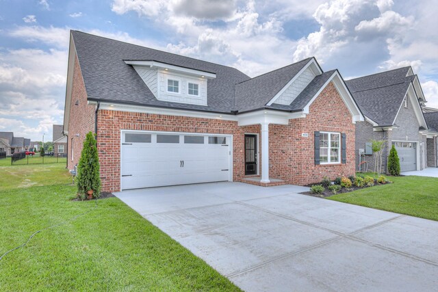 4020 Runyan Cv, Murfreesboro, TN 37127 - traditional-style house featuring brick siding, driveway, a shingled roof, and a front yard