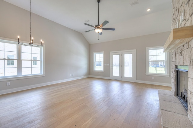 4020 Runyan Cv, Murfreesboro, TN 37127 - unfurnished living room featuring a fireplace, light wood finished floors, a ceiling fan, a chandelier, and high vaulted ceiling