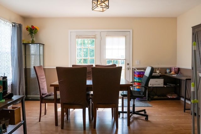 dining room with wood finished floors