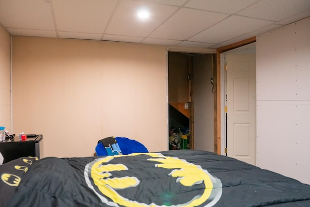 bedroom with a paneled ceiling