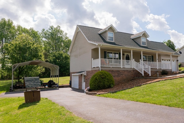 cape cod-style house featuring a porch, driveway, a carport, a front lawn, and an attached garage