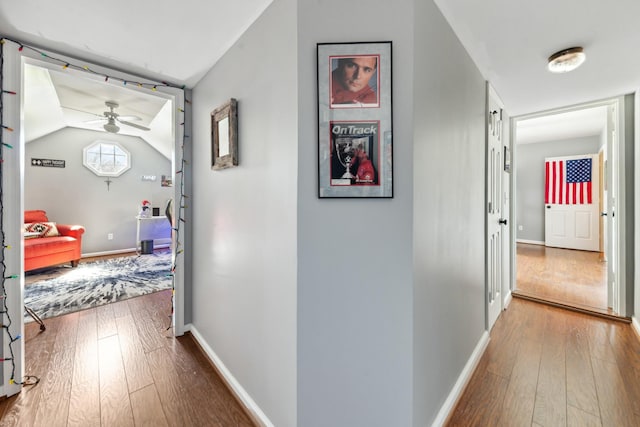 1408 Ridley Dr, Franklin, TN 37064 - hallway featuring wood-type flooring, baseboards, and lofted ceiling