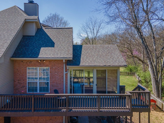 1408 Ridley Dr, Franklin, TN 37064 - back of property featuring a shingled roof, a wooden deck, a chimney, and brick siding