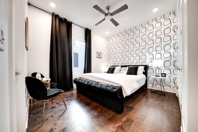 bedroom featuring ceiling fan, recessed lighting, and dark wood-type flooring
