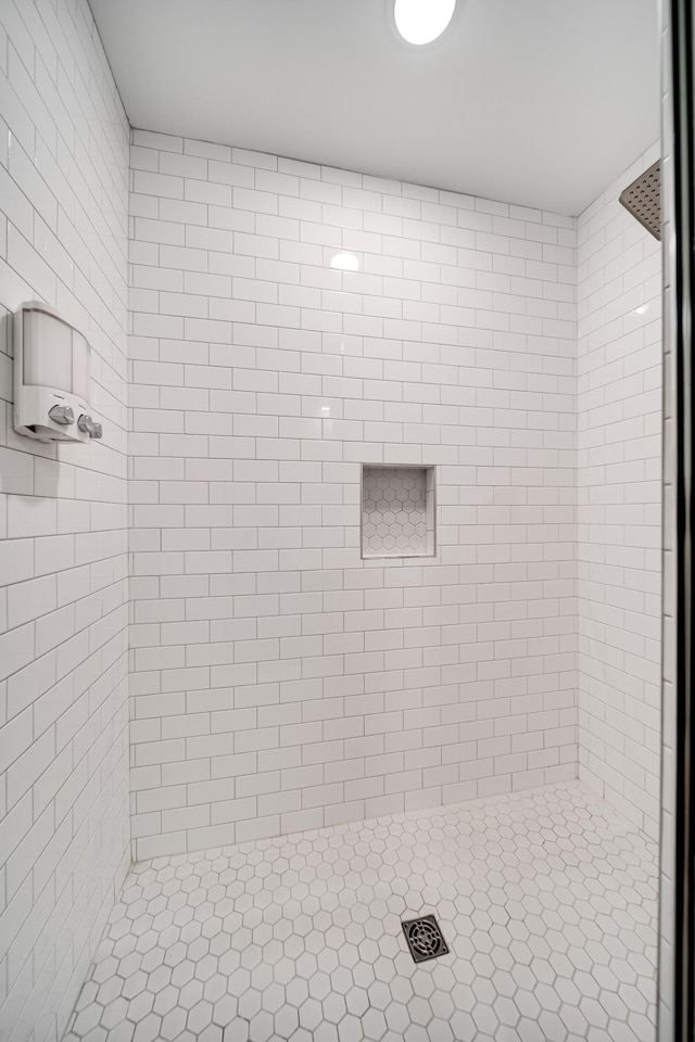 bathroom featuring a shower stall