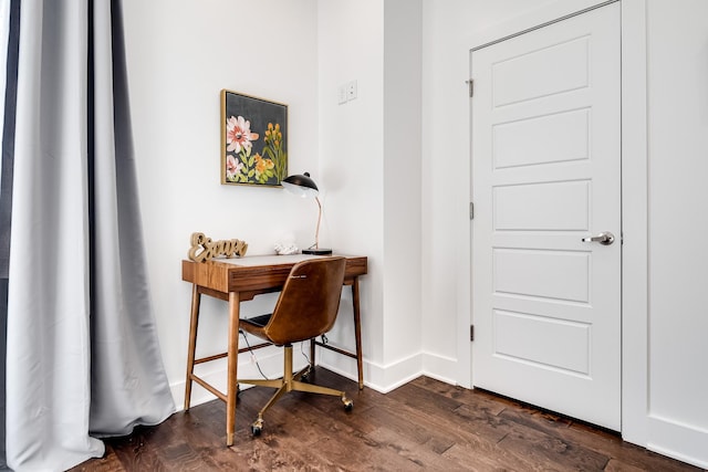 home office featuring baseboards and dark wood-style floors