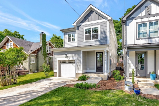 traditional-style house featuring a garage, a front yard, cooling unit, board and batten siding, and driveway