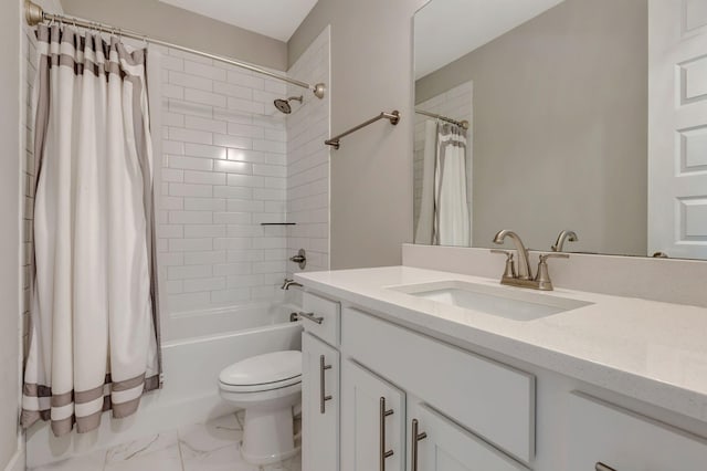 bathroom with vanity, toilet, marble finish floor, and shower / bath combo with shower curtain