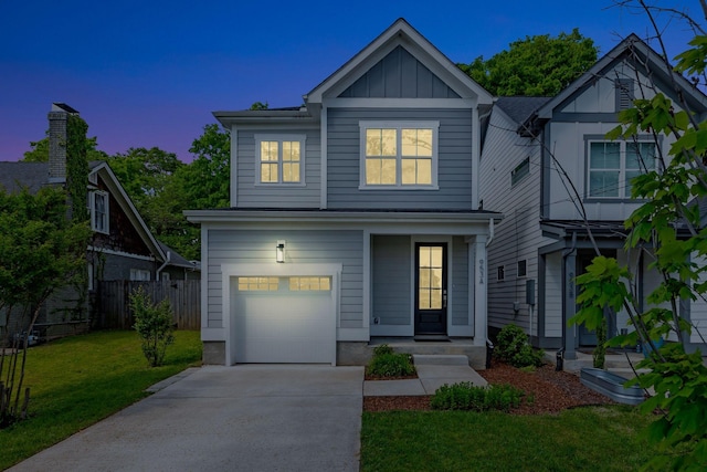 view of front of home with fence, an attached garage, a front lawn, board and batten siding, and driveway