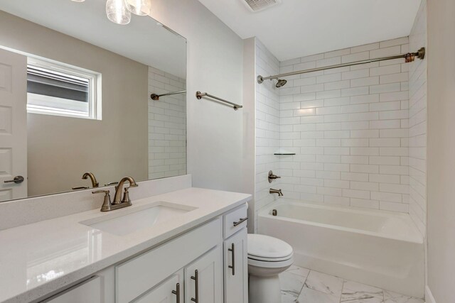 full bathroom featuring visible vents, vanity, marble finish floor, toilet, and shower / tub combination