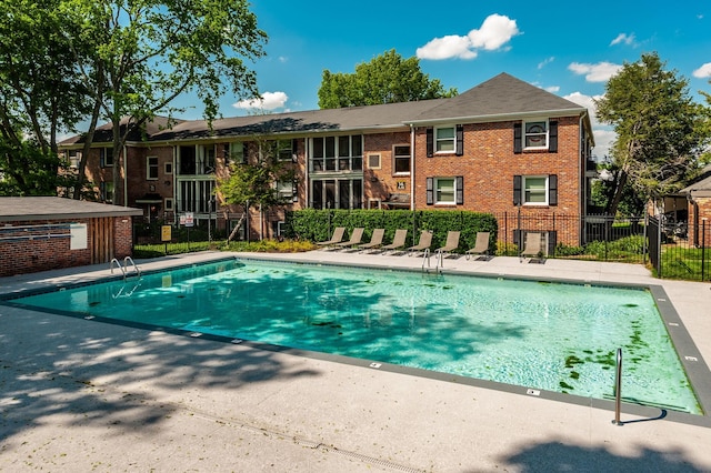 pool featuring fence