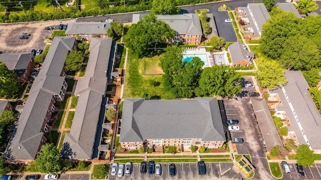 birds eye view of property with a residential view