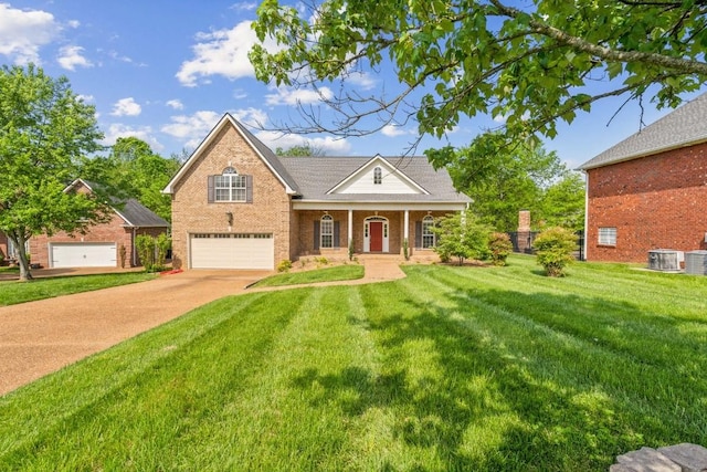 view of front of house with a front lawn, covered porch, brick siding, an attached garage, and driveway