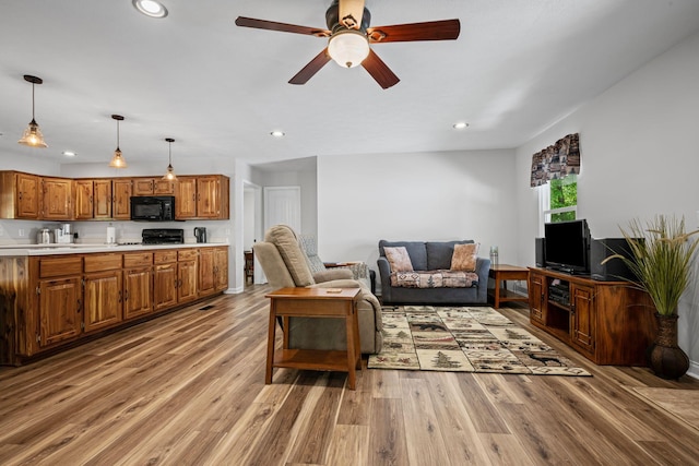606 Fortner Rd, Mc Ewen, TN 37101 - living room featuring recessed lighting, ceiling fan, and light wood finished floors