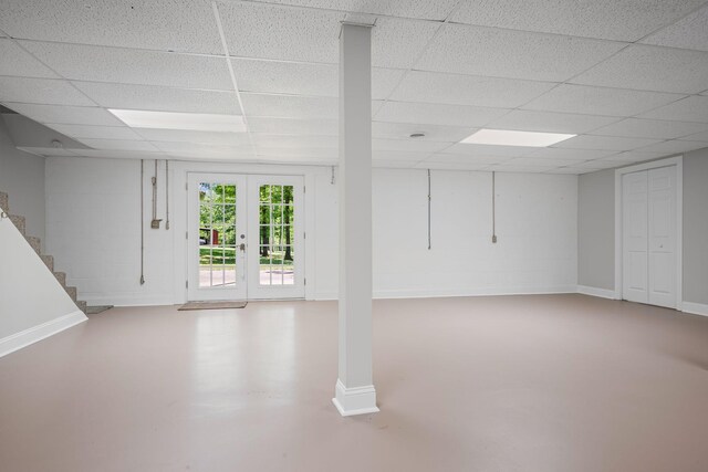 606 Fortner Rd, Mc Ewen, TN 37101 - below grade area featuring stairs, baseboards, and a drop ceiling