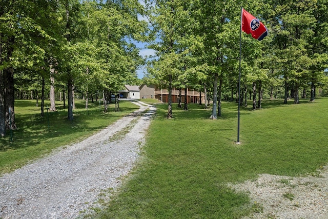606 Fortner Rd, Mc Ewen, TN 37101 - view of community with a yard and driveway