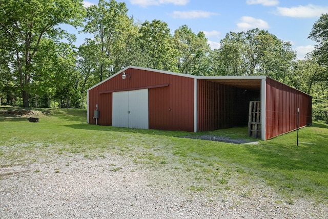 606 Fortner Rd, Mc Ewen, TN 37101 - view of pole building featuring a lawn and driveway