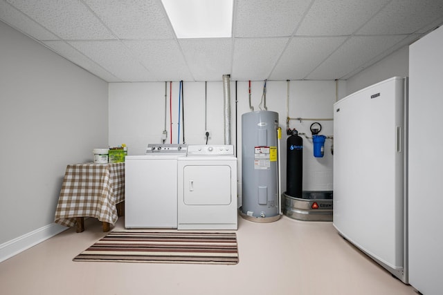 606 Fortner Rd, Mc Ewen, TN 37101 - laundry area featuring water heater, laundry area, and washing machine and dryer