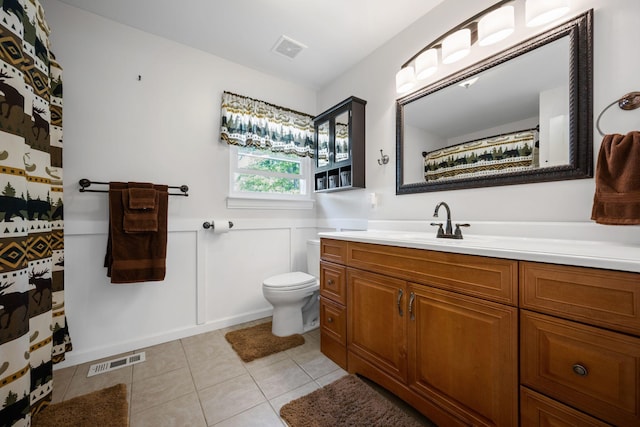 606 Fortner Rd, Mc Ewen, TN 37101 - bathroom with tile patterned floors, vanity, toilet, and visible vents