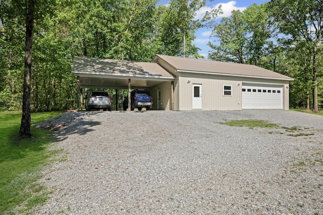 606 Fortner Rd, Mc Ewen, TN 37101 - garage with a garage and driveway