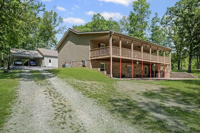 606 Fortner Rd, Mc Ewen, TN 37101 - back of house with ceiling fan, a lawn, a wooden deck, stairway, and gravel driveway