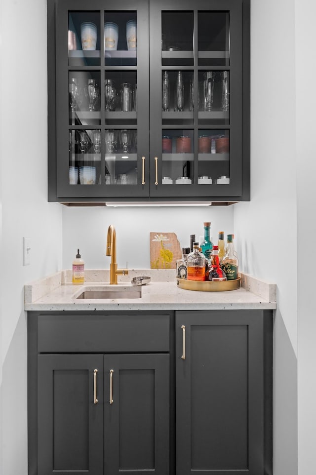 bar with a sink and bar area