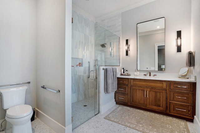 full bath featuring vanity, ornamental molding, toilet, baseboards, and a shower stall