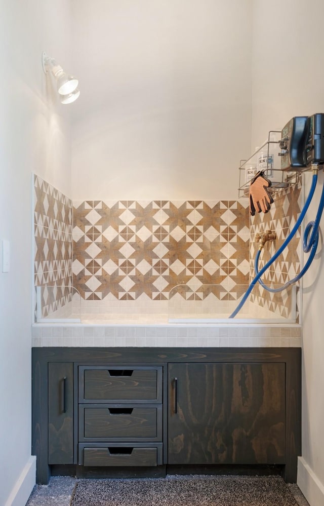 bathroom with baseboards