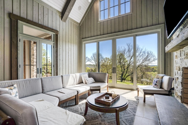 sunroom with french doors and beamed ceiling