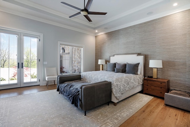 bedroom featuring crown molding, access to outside, recessed lighting, and wood finished floors