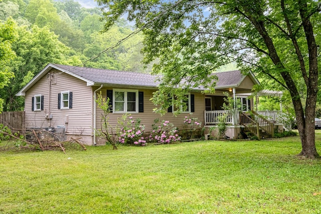 4051 New Highway 96 W, Franklin, TN 37064 - ranch-style house featuring a porch and a front lawn