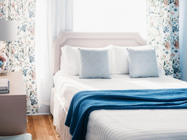bedroom featuring wood finished floors