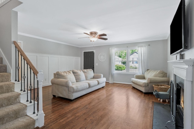 1077 Meandering Way, Franklin, TN 37067 - living area featuring stairs, a ceiling fan, a fireplace with flush hearth, and wood finished floors