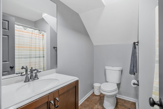1077 Meandering Way, Franklin, TN 37067 - full bathroom featuring vanity, lofted ceiling, toilet, baseboards, and tile patterned floors
