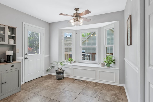 1077 Meandering Way, Franklin, TN 37067 - doorway to outside featuring visible vents, baseboards, ceiling fan, and a wealth of natural light