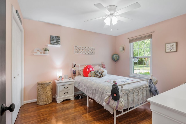 1077 Meandering Way, Franklin, TN 37067 - bedroom featuring baseboards, a ceiling fan, and wood finished floors
