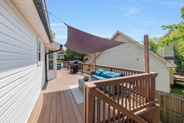 1077 Meandering Way, Franklin, TN 37067 - wooden terrace featuring an outdoor living space and area for grilling
