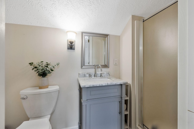 1077 Meandering Way, Franklin, TN 37067 - bathroom featuring vanity, a shower stall, toilet, and a textured ceiling