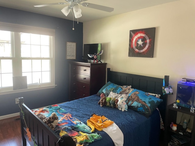 1077 Meandering Way, Franklin, TN 37067 - bedroom with baseboards, ceiling fan, wood finished floors, and multiple windows