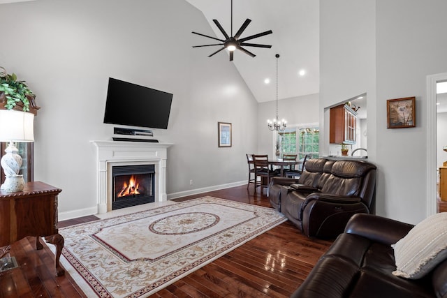 433 Stanford Dr, Flintstone, GA 30725 - living area with hardwood / wood-style floors, baseboards, high vaulted ceiling, a fireplace with flush hearth, and ceiling fan with notable chandelier