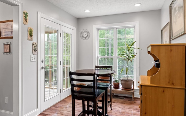 433 Stanford Dr, Flintstone, GA 30725 - doorway to outside with recessed lighting, a textured ceiling, and light wood-style flooring