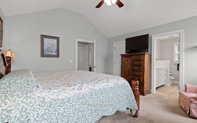 433 Stanford Dr, Flintstone, GA 30725 - bedroom with a ceiling fan, light colored carpet, vaulted ceiling, light tile patterned floors, and ensuite bathroom