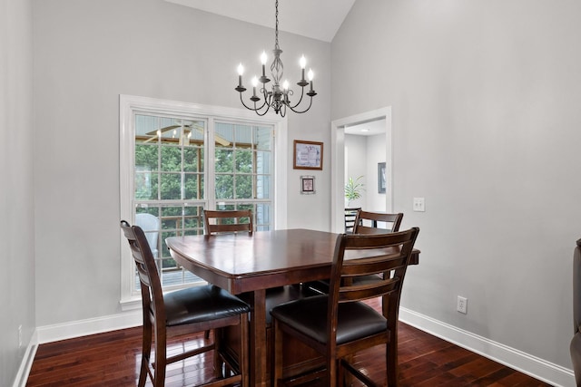 433 Stanford Dr, Flintstone, GA 30725 - dining room featuring baseboards, dark wood finished floors, high vaulted ceiling, and a notable chandelier
